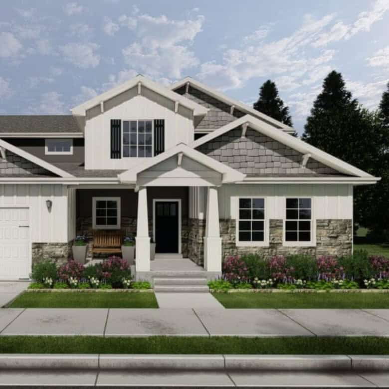 Beautiful modern craftsman-style house with stone accents and lush landscaping in High Springs.