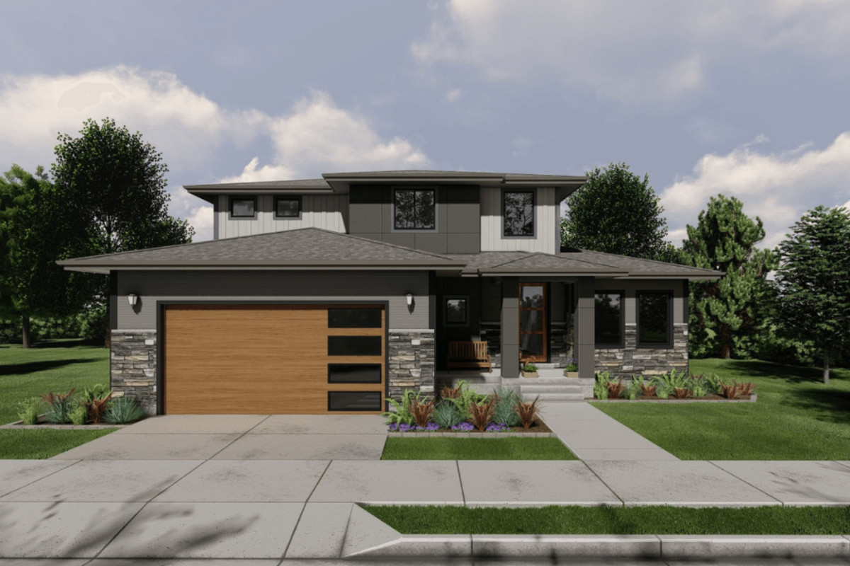 Edgeworth home featuring vaulted great room with open-to-above design, spacious kitchen with walk-in pantry, and main-floor primary suite.