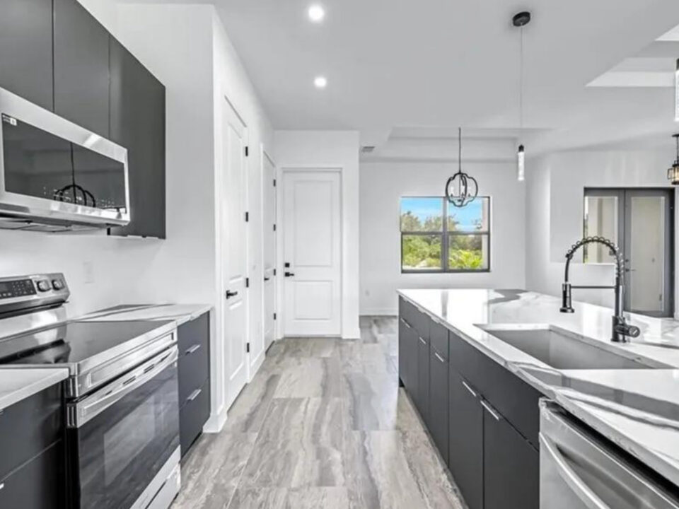 Modern open-concept interior showcasing the design, functionality, and features commonly found in new homes throughout Florida.